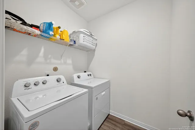 a utility room with dryer and washer