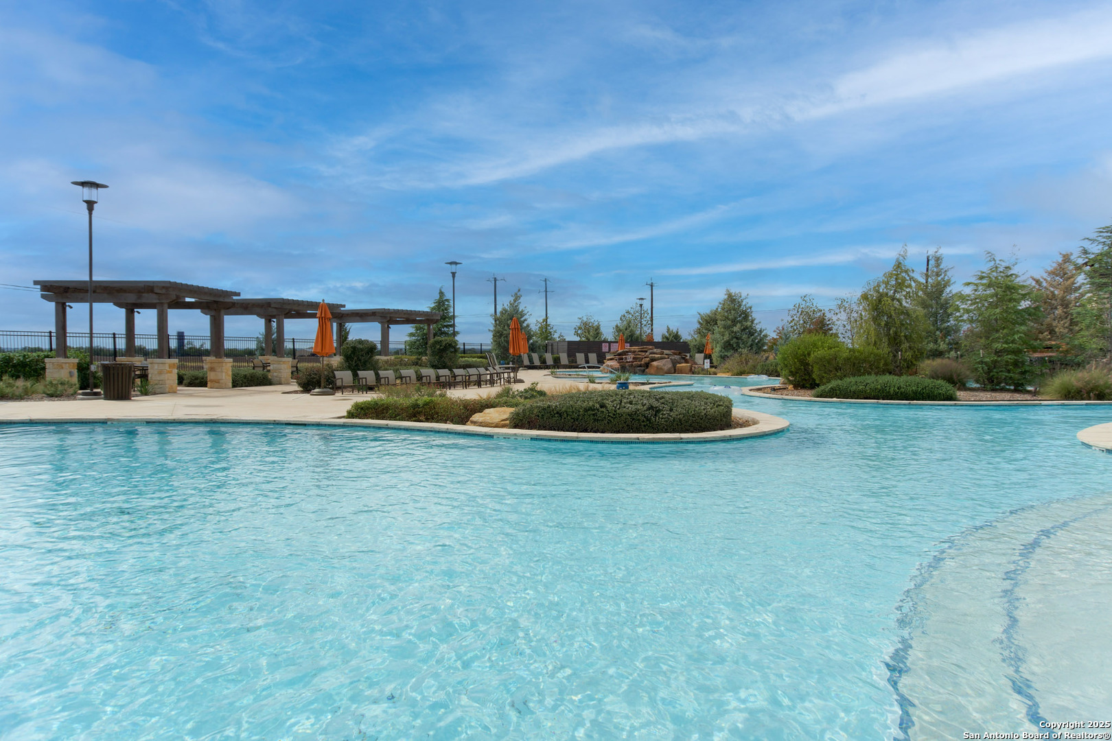 7710 Fern Hollow San Antonio, TX 78252 - Photo 24 of 26 a view of a lake with a big yard