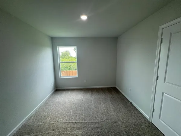 an empty room with window