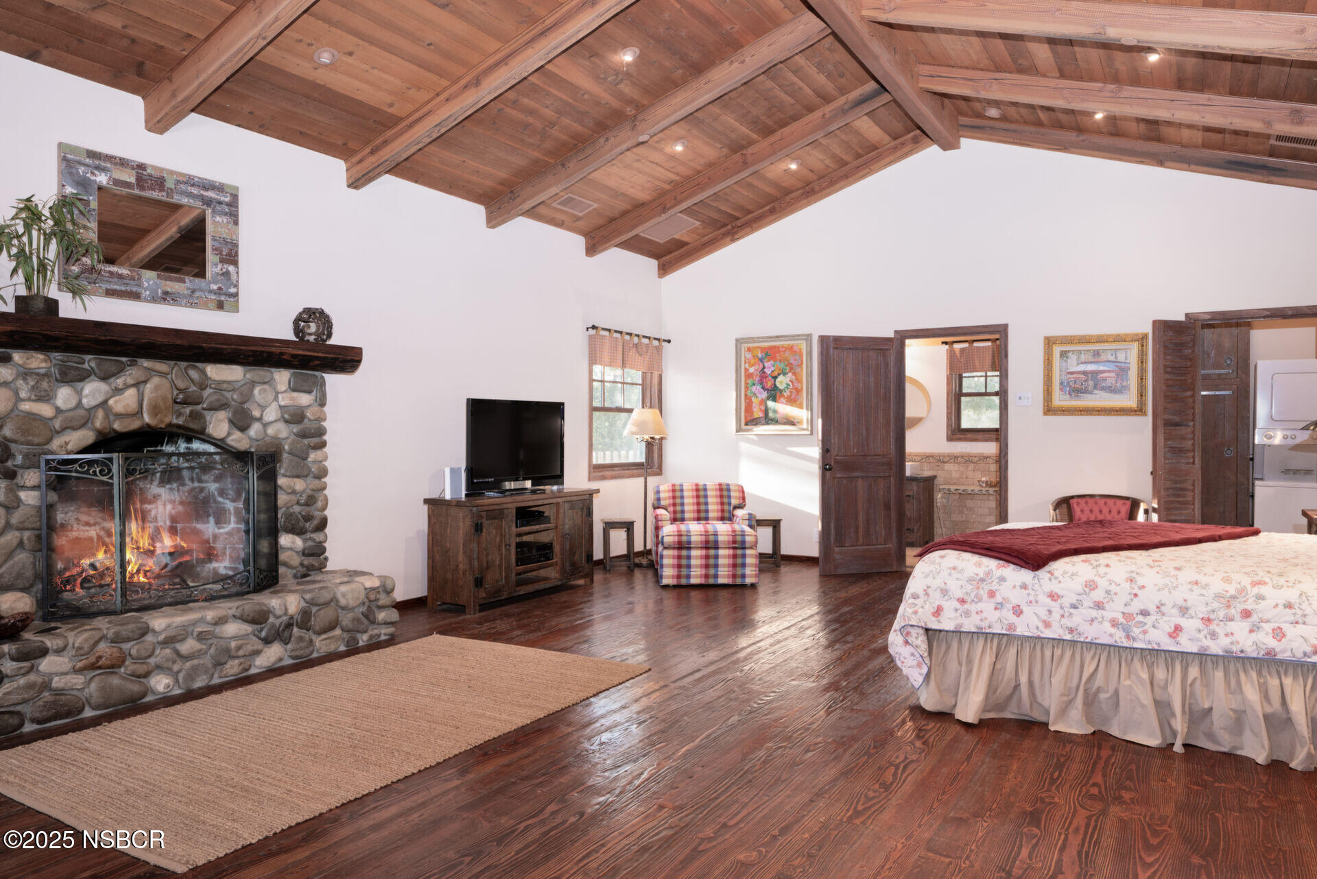 4086 East Oak Trail Road Santa Ynez, CA 93460 - Photo 43 of 57 a living room with furniture and a fireplace