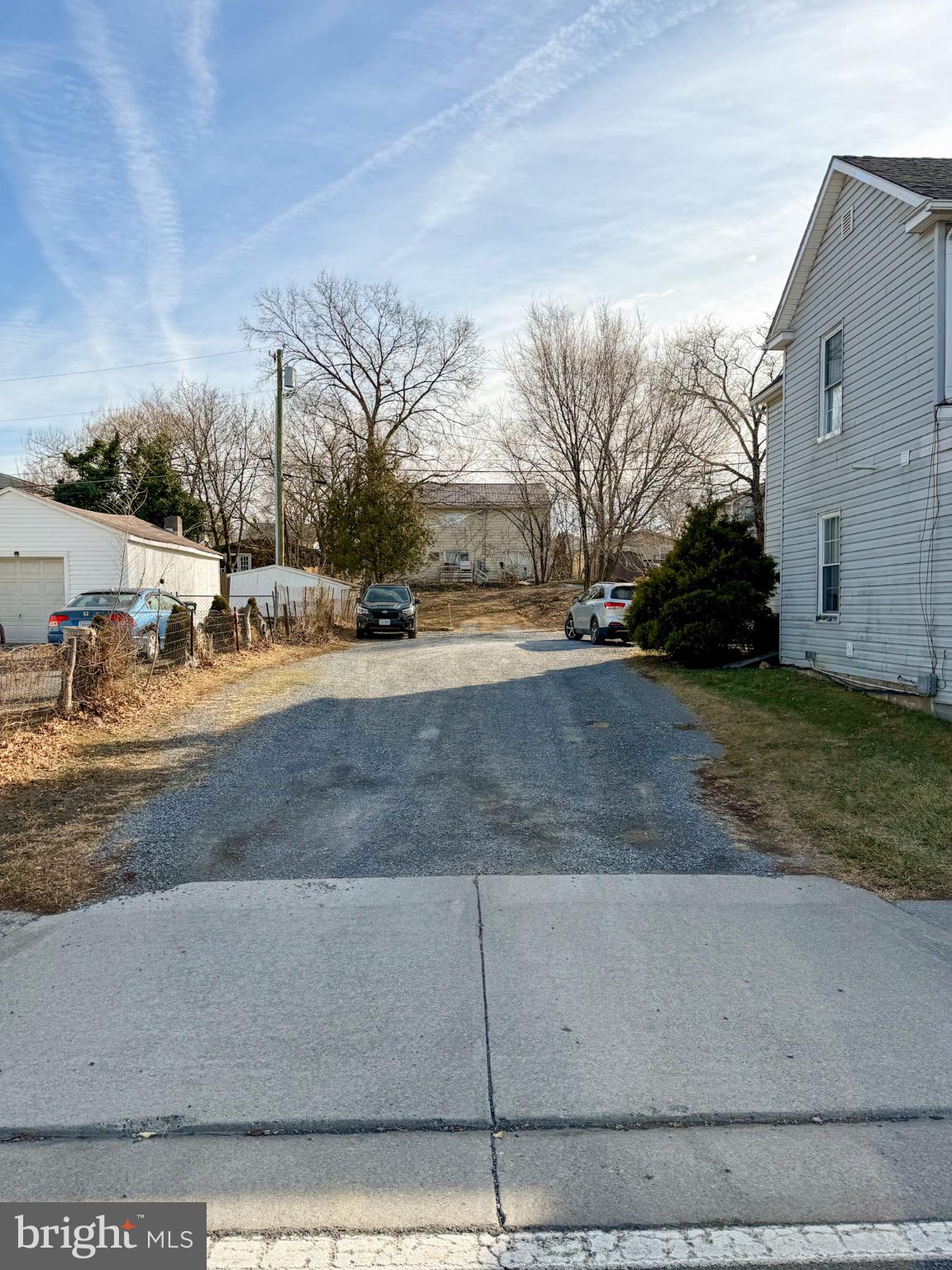 24 North Pleasant Valley Road Winchester, VA 22601 - Photo 3 of 11 Charming lane leading to hidden potential.
