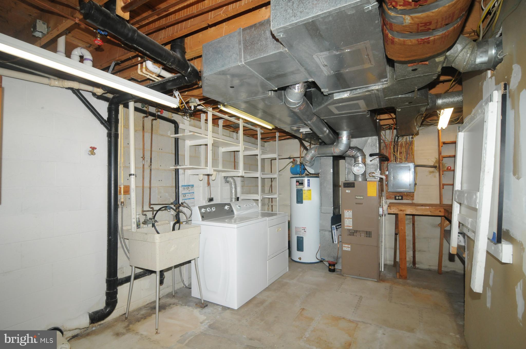 14 Johnson Road Pasadena, MD 21122 - Photo 12 of 13 Basement Laundry and Utility Room