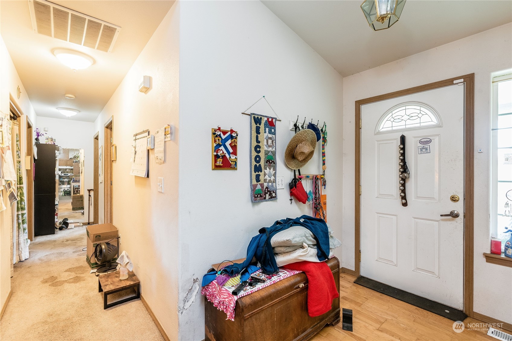 10136 Meadowside Lane Southwest Rochester, WA 98579 - Photo 11 of 32 a room with furniture and a window