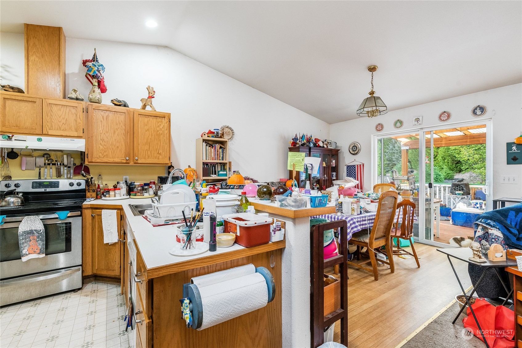 10136 Meadowside Lane Southwest Rochester, WA 98579 - Photo 7 of 32 a view of a play room with toys and a chandelier