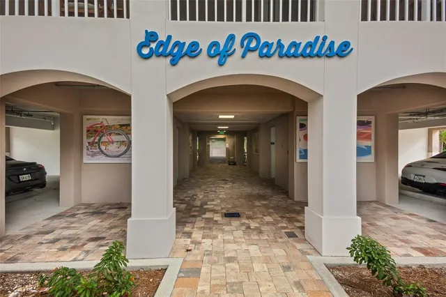 a blue and white sitting area with wall painting