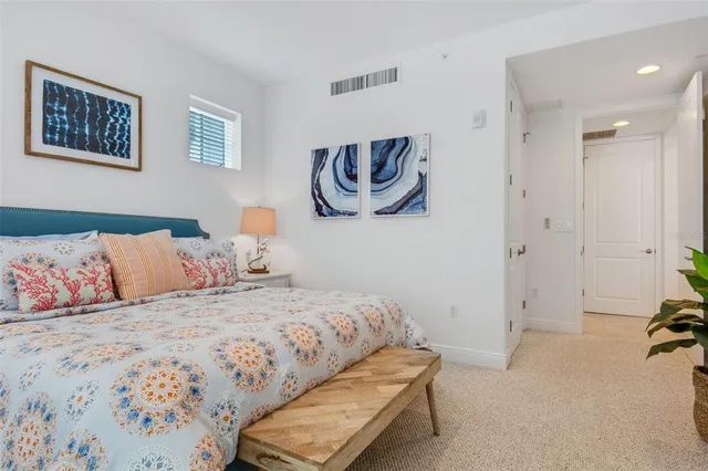 a view of a city with an ocean view