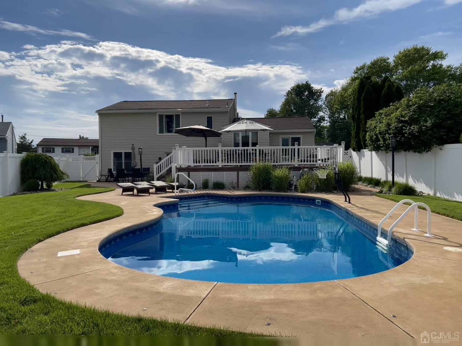 3 Barton Road Old Bridge, NJ 08857 - Photo 2 of 38 a view of a house with swimming pool and sitting area