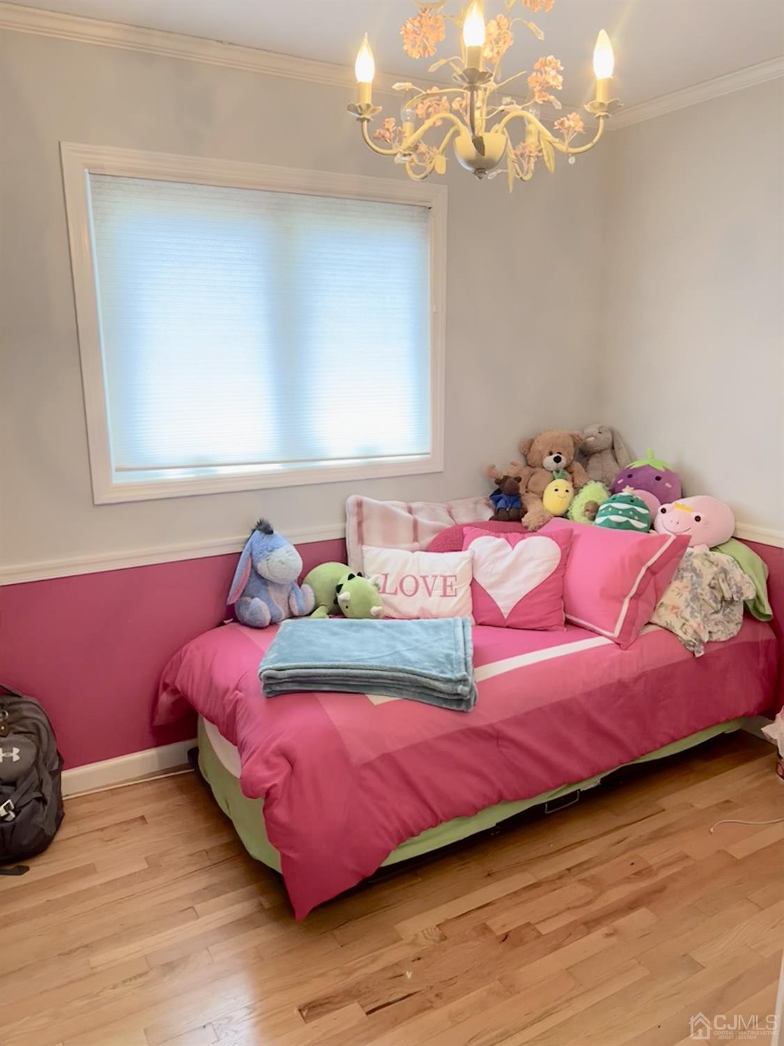 3 Barton Road Old Bridge, NJ 08857 - Photo 27 of 38 a bedroom with a bed and a window