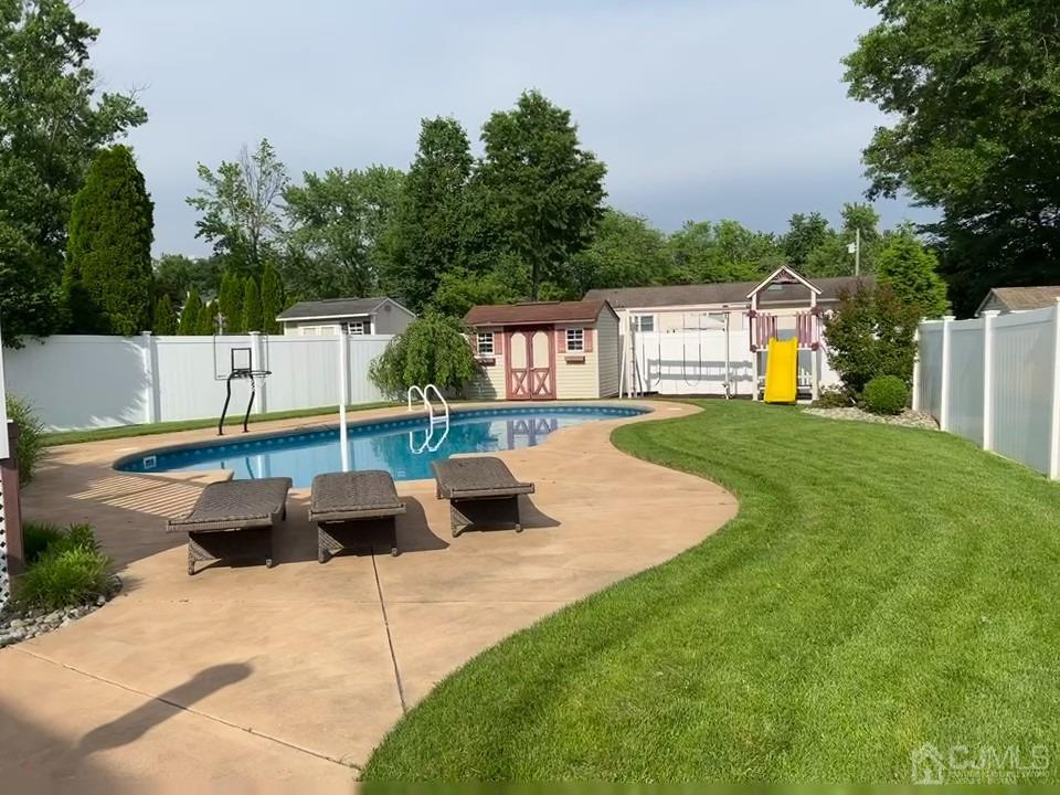 3 Barton Road Old Bridge, NJ 08857 - Photo 4 of 38 a view of backyard with swimming pool and furniture