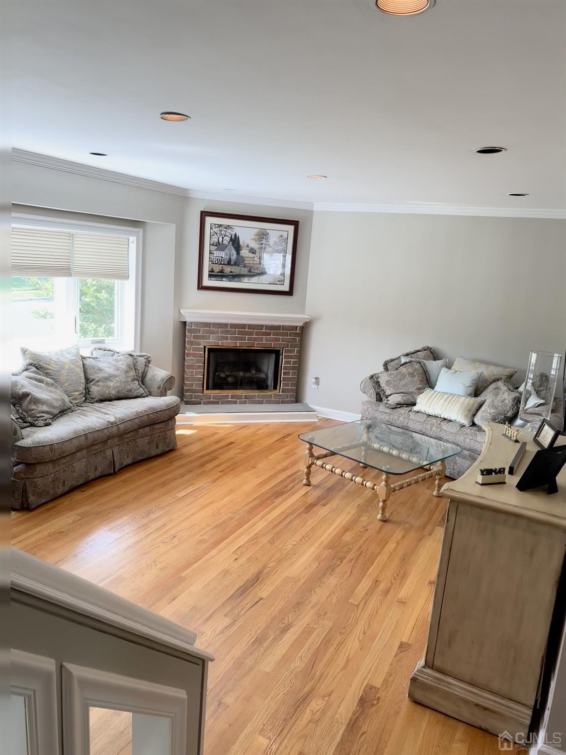 3 Barton Road Old Bridge, NJ 08857 - Photo 8 of 38 a living room with furniture and a flat screen tv