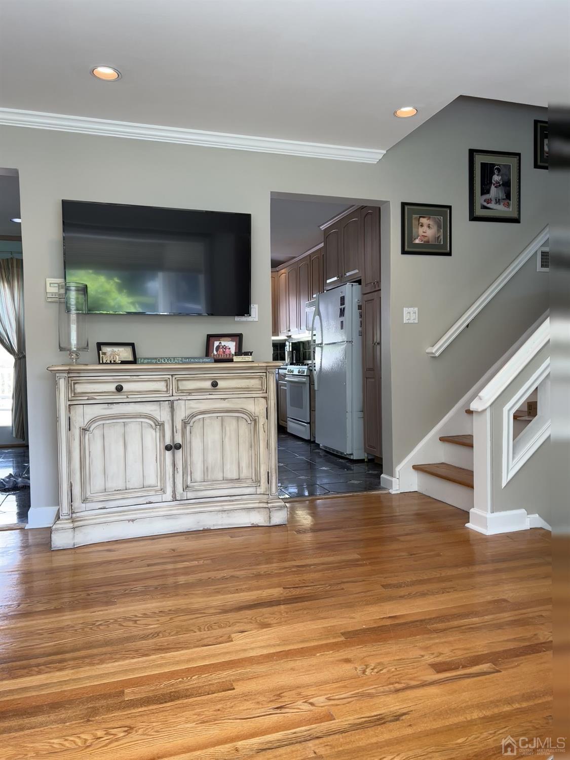 3 Barton Road Old Bridge, NJ 08857 - Photo 10 of 38 a kitchen view with stainless steel appliances wooden floor and living room view