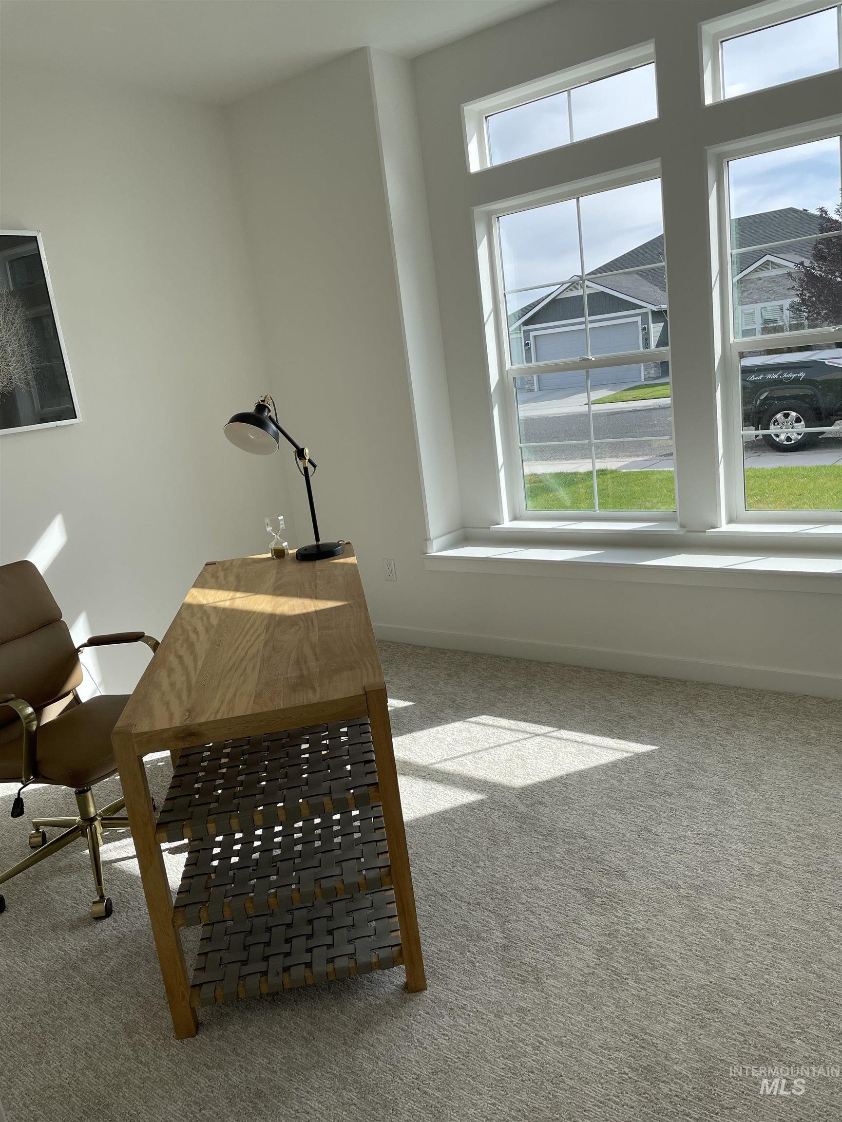 916 Kenbrook Loop Twin Falls, ID 83301 - Photo 12 of 30 Home office featuring light colored carpet and baseboards