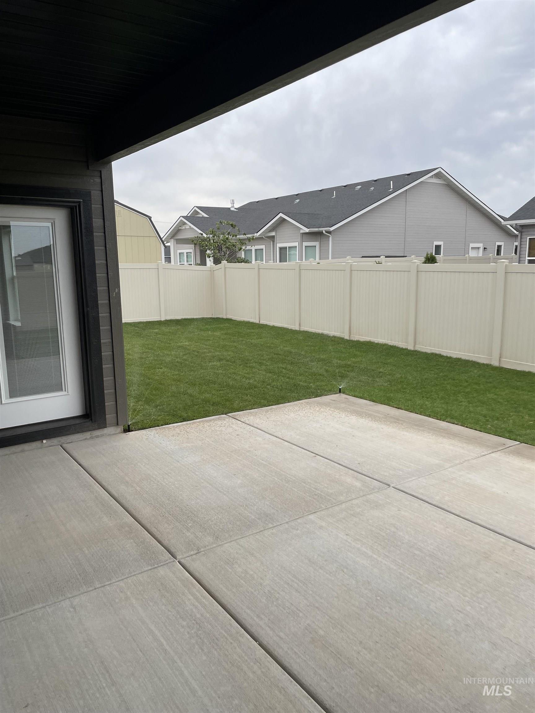 916 Kenbrook Loop Twin Falls, ID 83301 - Photo 28 of 30 Fenced backyard featuring a patio area