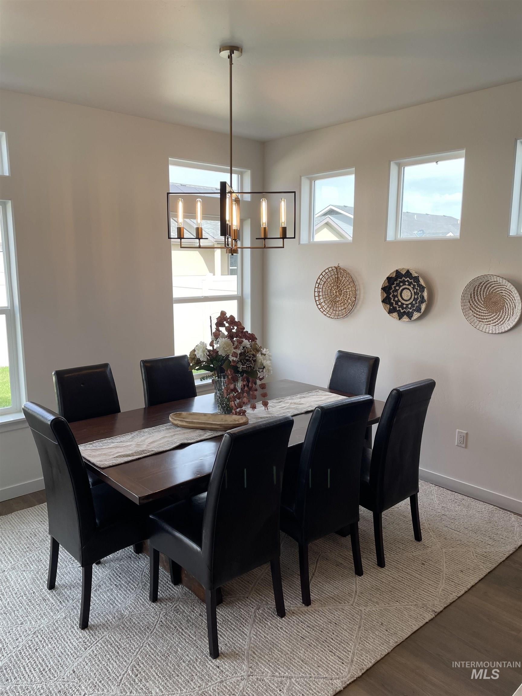 916 Kenbrook Loop Twin Falls, ID 83301 - Photo 8 of 30 Dining space with baseboards and light wood finished floors