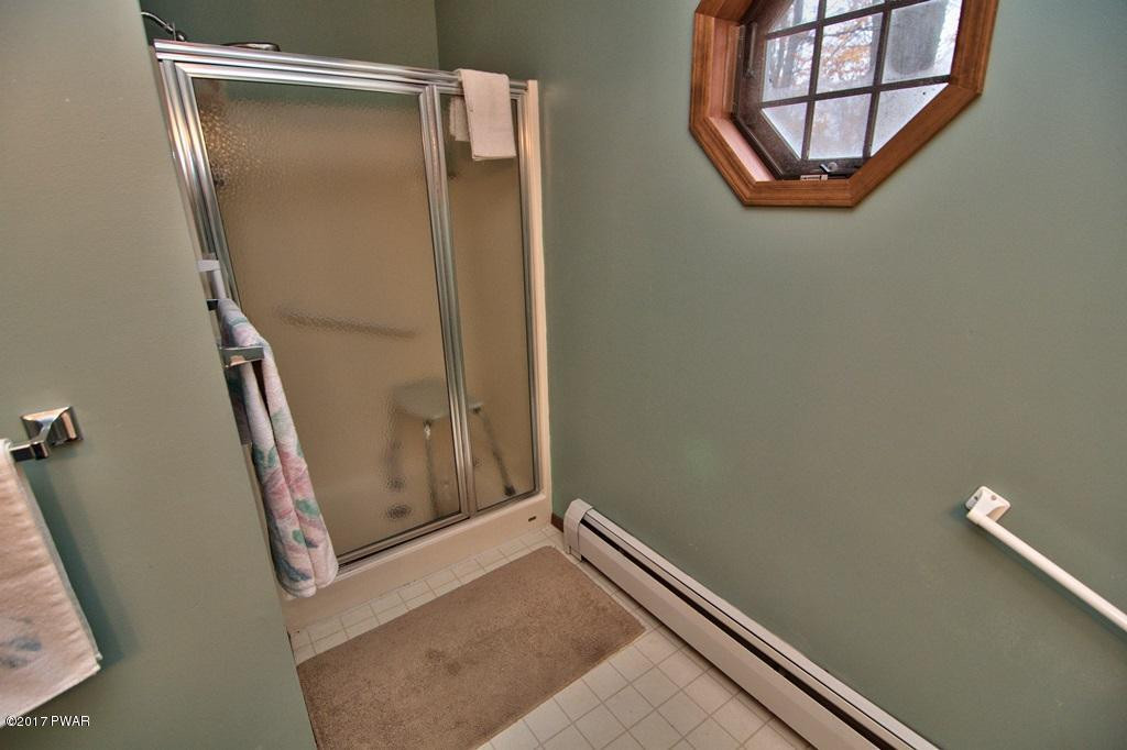 3296 Northgate Road Lake Ariel, PA 18436 - Photo 20 of 33 view of room with window and glass door