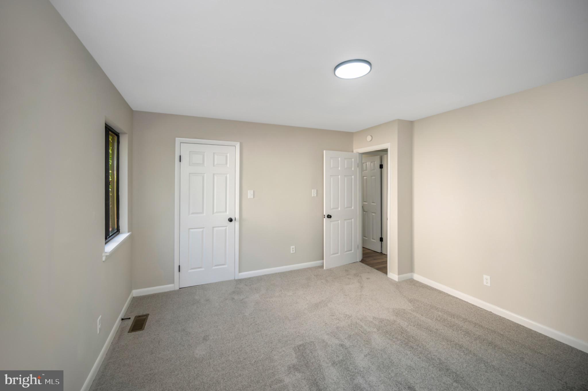 420 Birdie Road Locust Grove, VA 22508 - Photo 16 of 53 a view of an empty room with a window