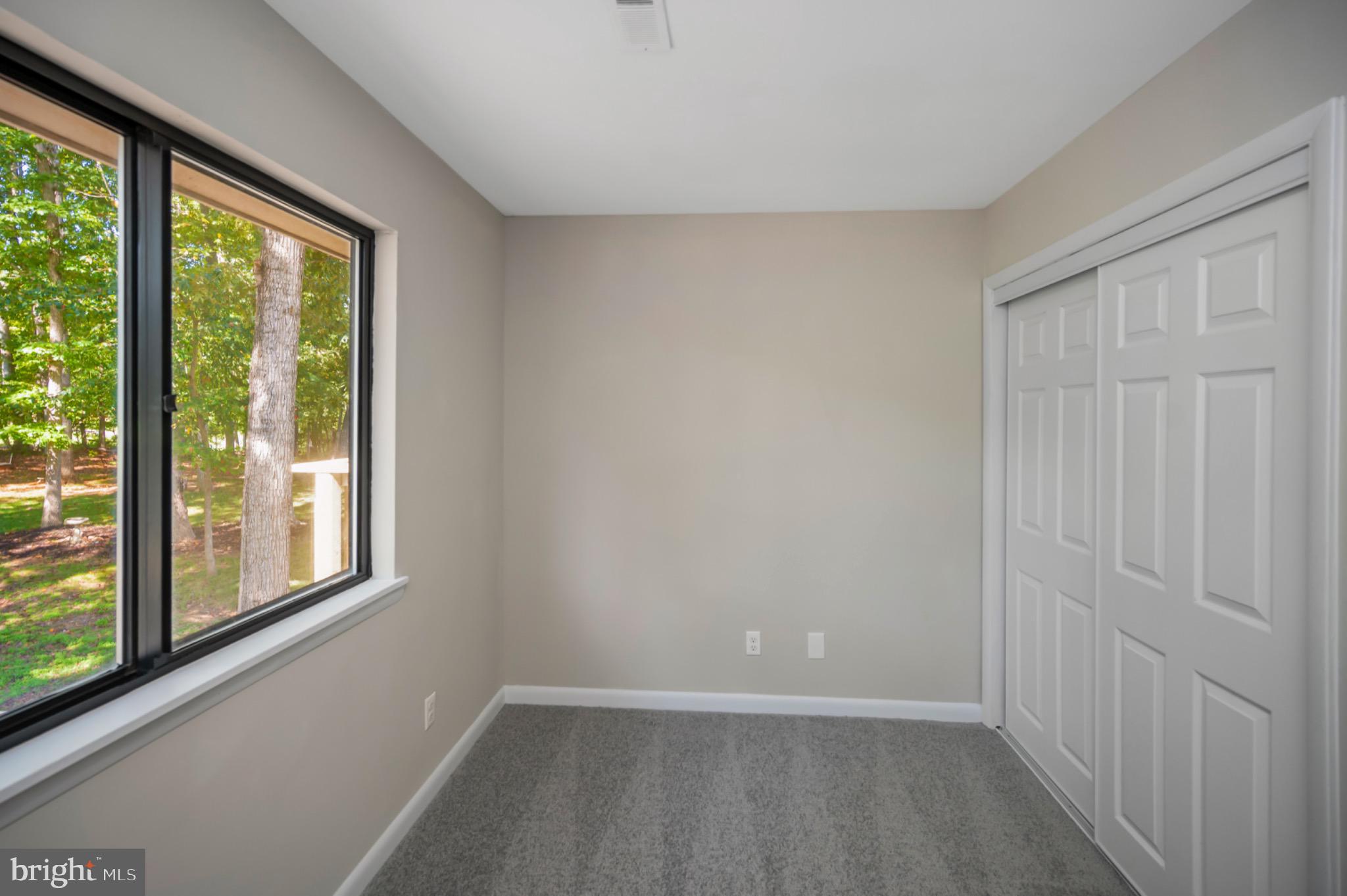 420 Birdie Road Locust Grove, VA 22508 - Photo 23 of 53 a view of an empty room with a window