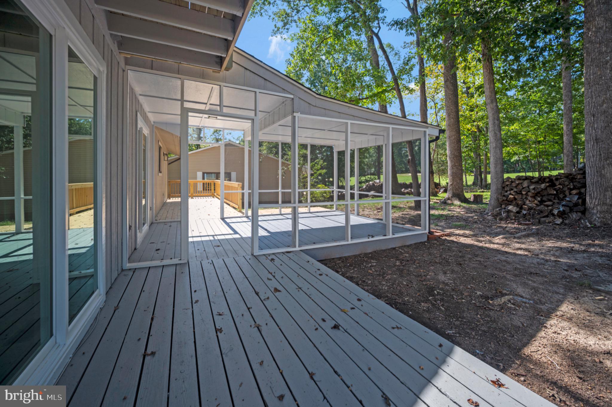 420 Birdie Road Locust Grove, VA 22508 - Photo 32 of 53 a view of outdoor space with wooden floor and trees