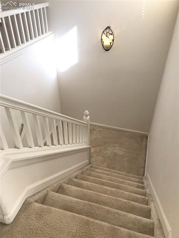 4160 Diamond Ridge View Colorado Springs, CO 80918 - Photo 10 of 26 Stair to Upper Level