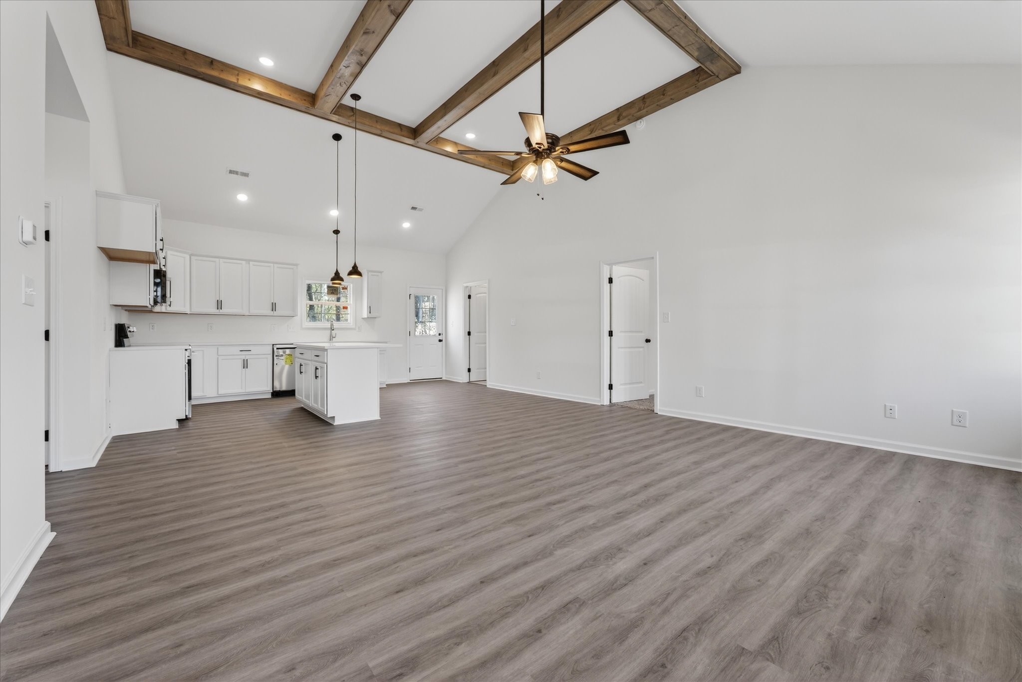 613 Hill Road Clarksville, TN 37040 - Photo 11 of 37 a view of a kitchen with a sink and wooden floor