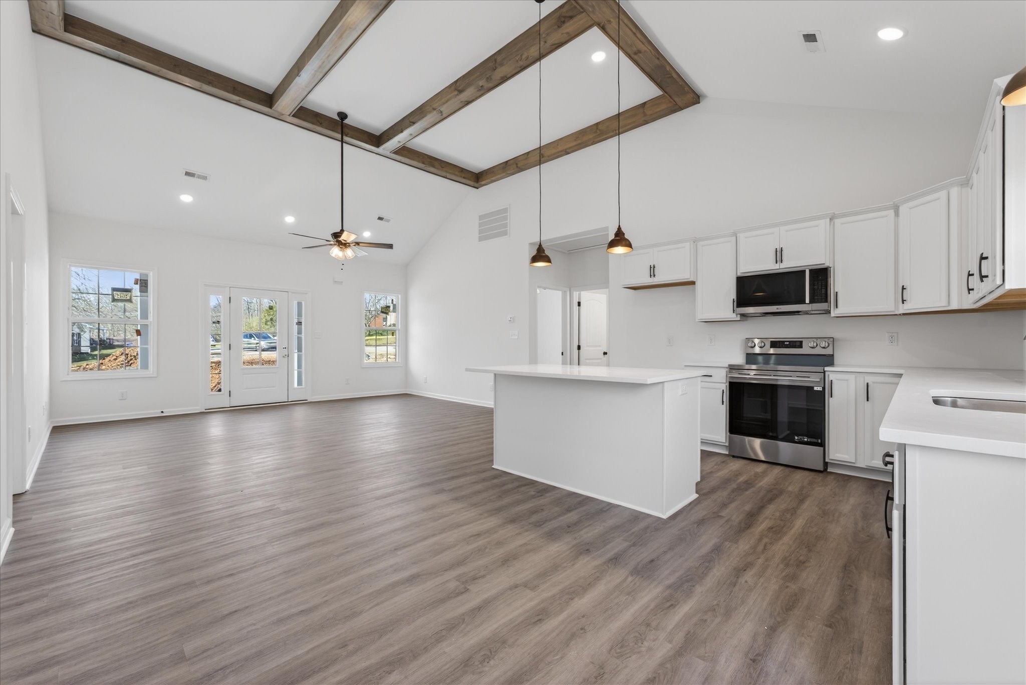 613 Hill Road Clarksville, TN 37040 - Photo 18 of 37 a view of kitchen with cabinets and wooden floor