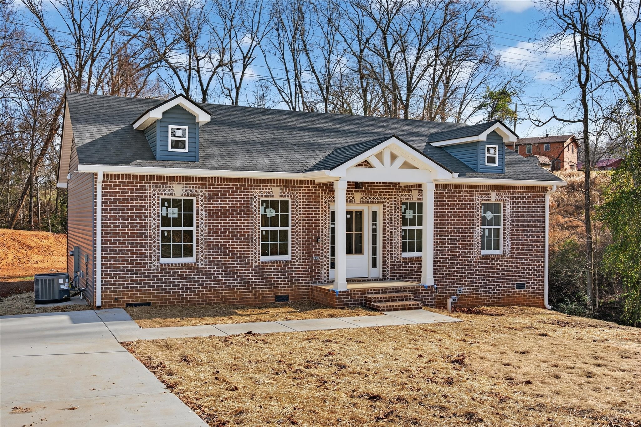 613 Hill Road Clarksville, TN 37040 - Photo 3 of 37 a front view of a house with a yard