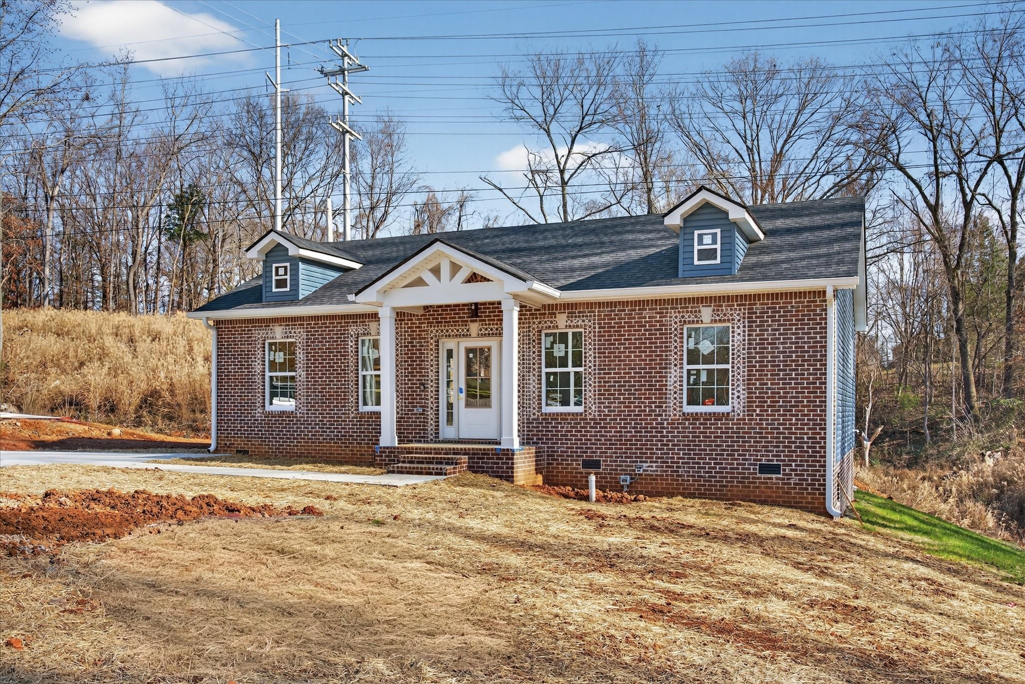613 Hill Road Clarksville, TN 37040 - Photo 4 of 37 a front view of a house with a yard and garage