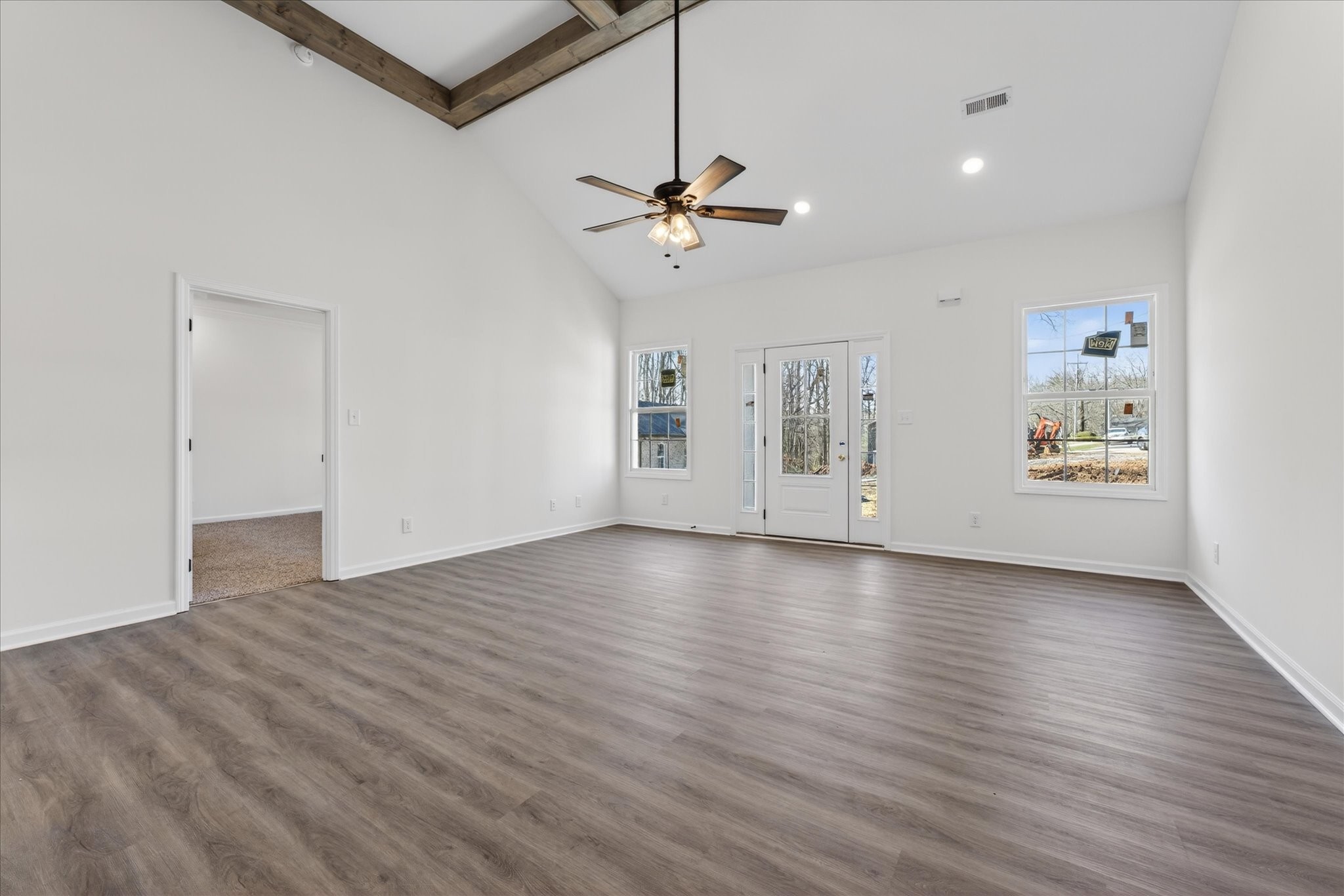 613 Hill Road Clarksville, TN 37040 - Photo 10 of 37 wooden floor in an empty room with a window