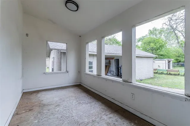 a view of livingroom with furniture wooden floor and window