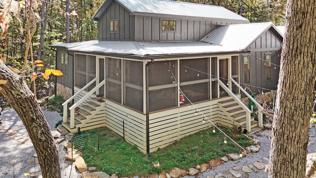2266 Timberwood Trace Monteagle, TN 37356 - Photo 2 of 47 a view of a house with a wooden deck