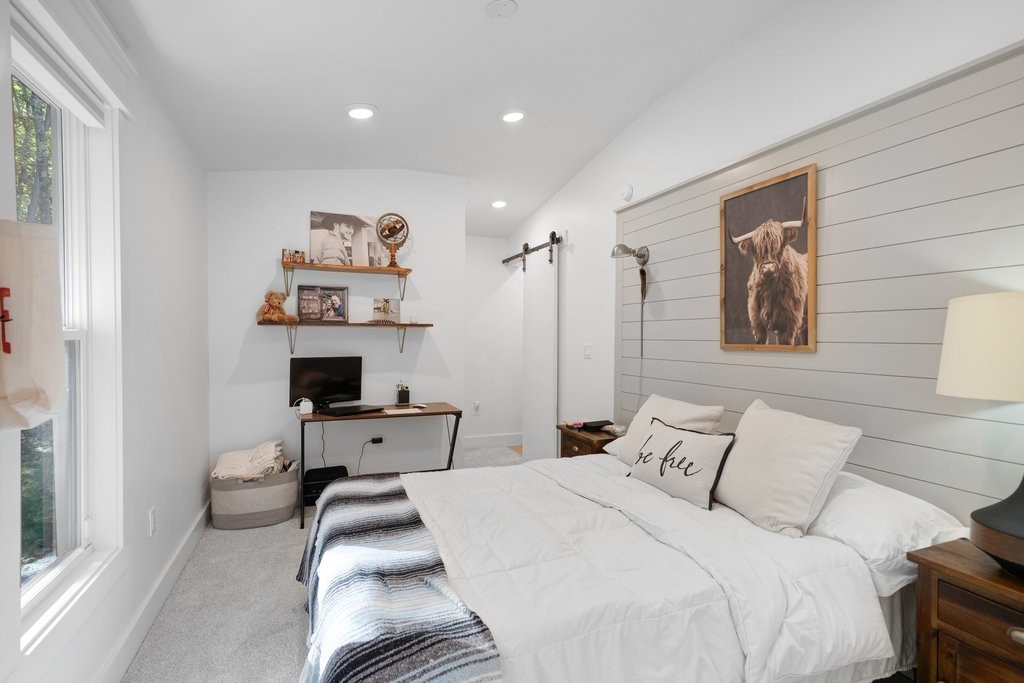 2266 Timberwood Trace Monteagle, TN 37356 - Photo 27 of 47 a bedroom with furniture and white walls