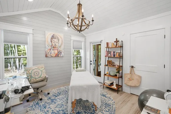 a living room with furniture and a window
