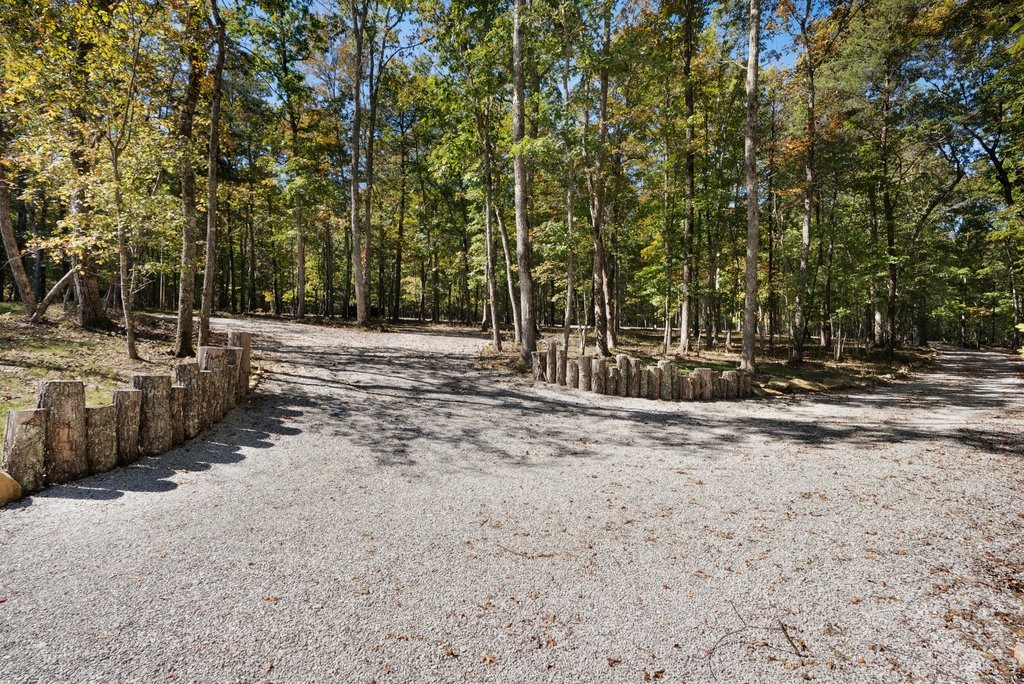 2266 Timberwood Trace Monteagle, TN 37356 - Photo 44 of 47 a view of a yard with large trees