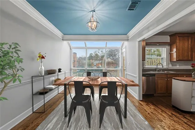 a living room with furniture and a table