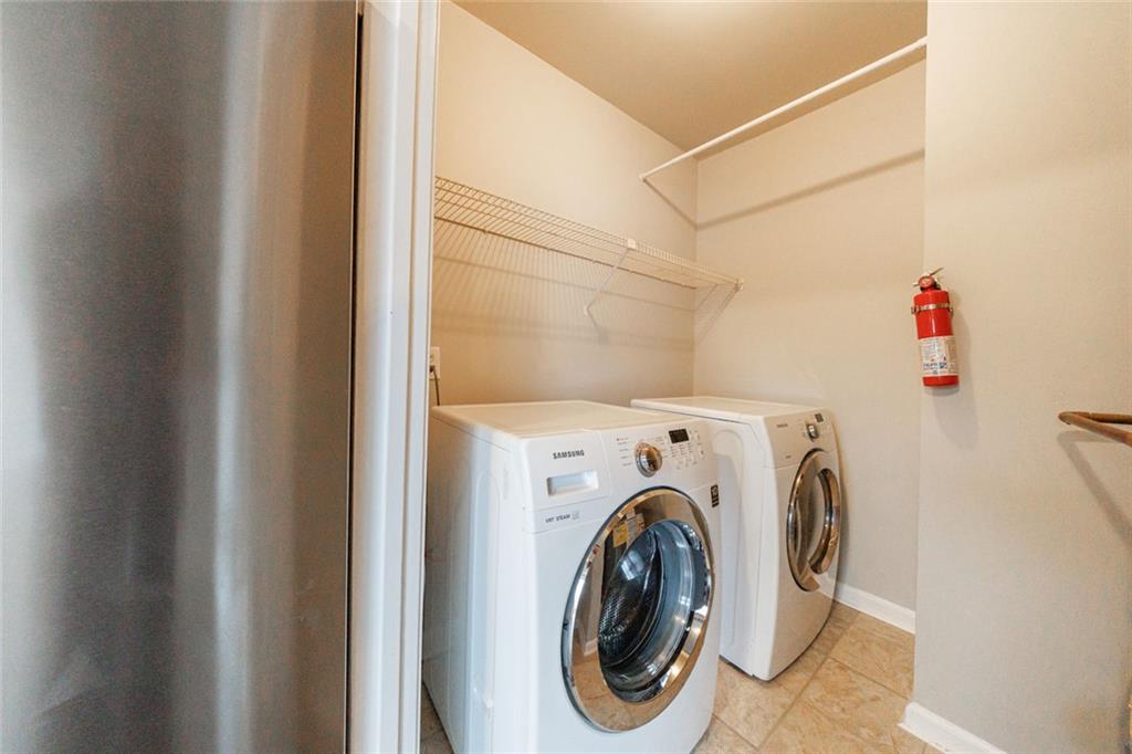 125 Mt Vernon Circle Atlanta, GA 30338 - Photo 19 of 62 a utility room with dryer and washer