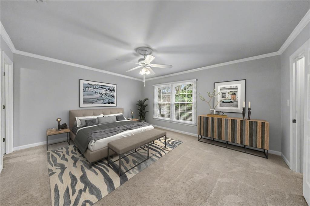 125 Mt Vernon Circle Atlanta, GA 30338 - Photo 22 of 62 a spacious bedroom with a bed a couch and windows