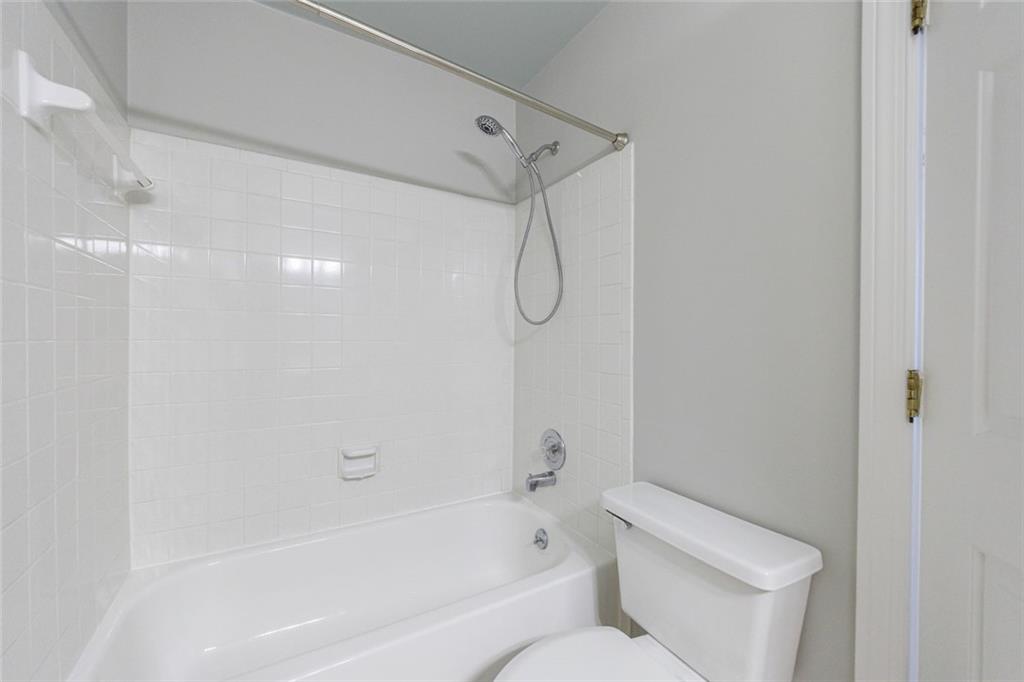 125 Mt Vernon Circle Atlanta, GA 30338 - Photo 34 of 62 a bathroom with a toilet and a shower