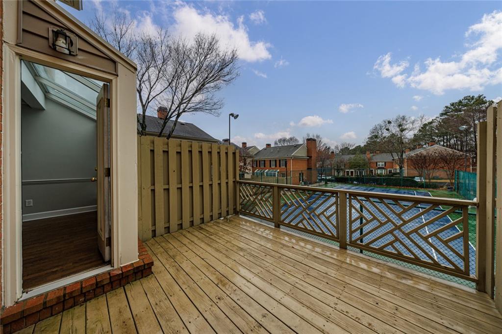 125 Mt Vernon Circle Atlanta, GA 30338 - Photo 36 of 62 a view of balcony with wooden floor