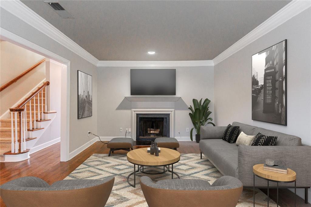 125 Mt Vernon Circle Atlanta, GA 30338 - Photo 5 of 62 a living room with furniture a fireplace and a large window