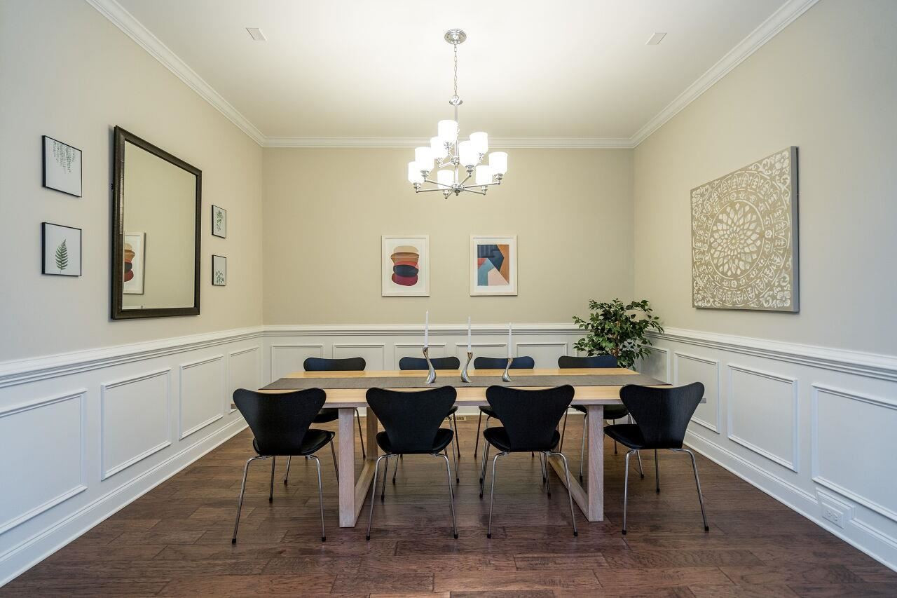 5264 Aleppo Lane Raleigh, NC 27613 - Photo 5 of 30 Enjoy entertaining with the wainscoting, generous trim and open flow. Dining Room
