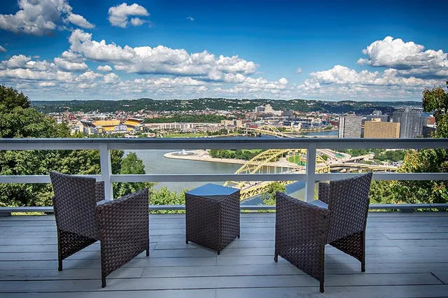 a view of a balcony with city view