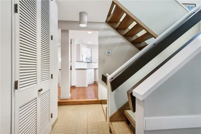 a view of a hallway view with staircase