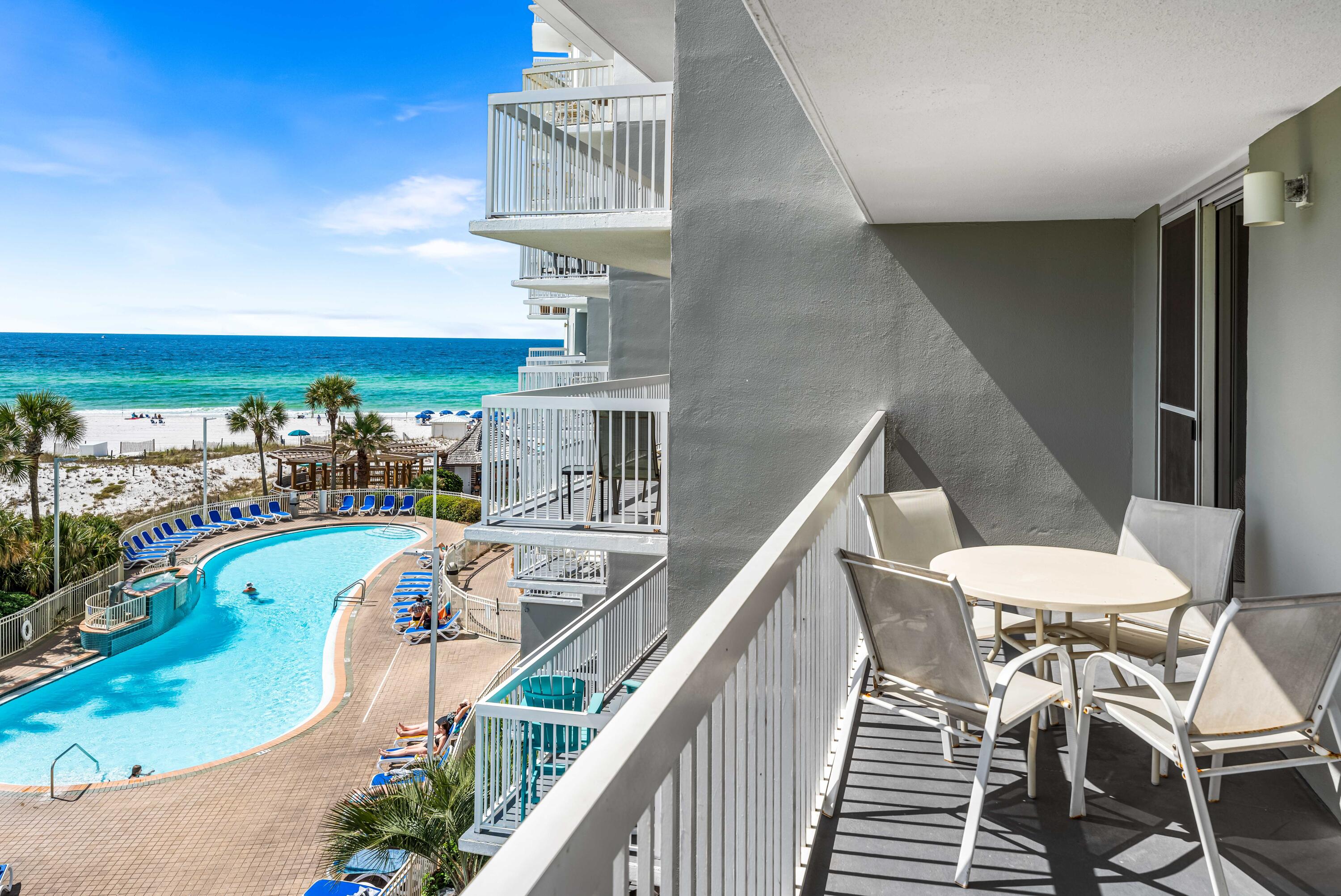 1002 Highway 98, Unit 415 Destin, FL 32541 - Photo 11 of 31 a view of a swimming pool with seating area