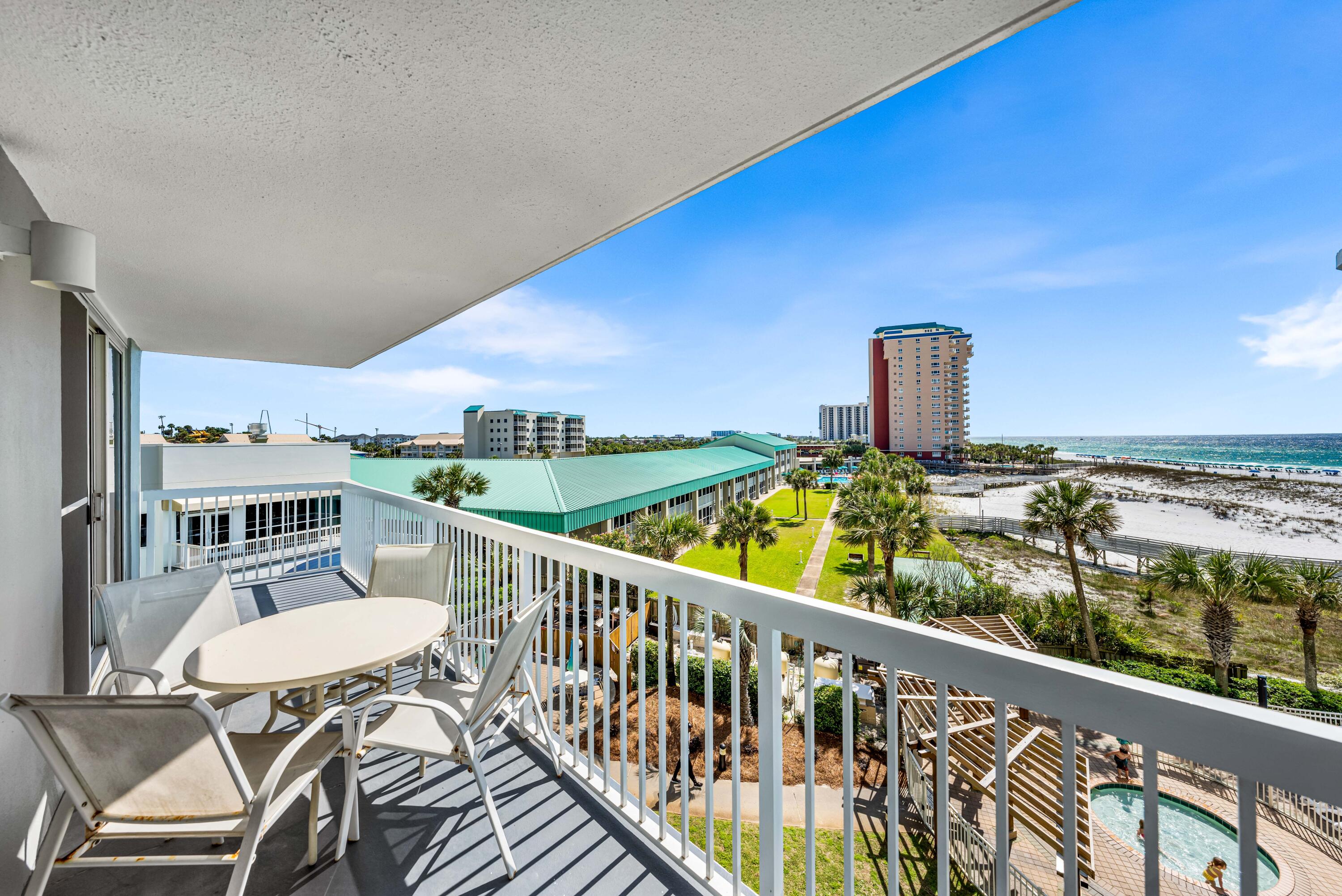1002 Highway 98, Unit 415 Destin, FL 32541 - Photo 18 of 31 a view of a balcony with chairs