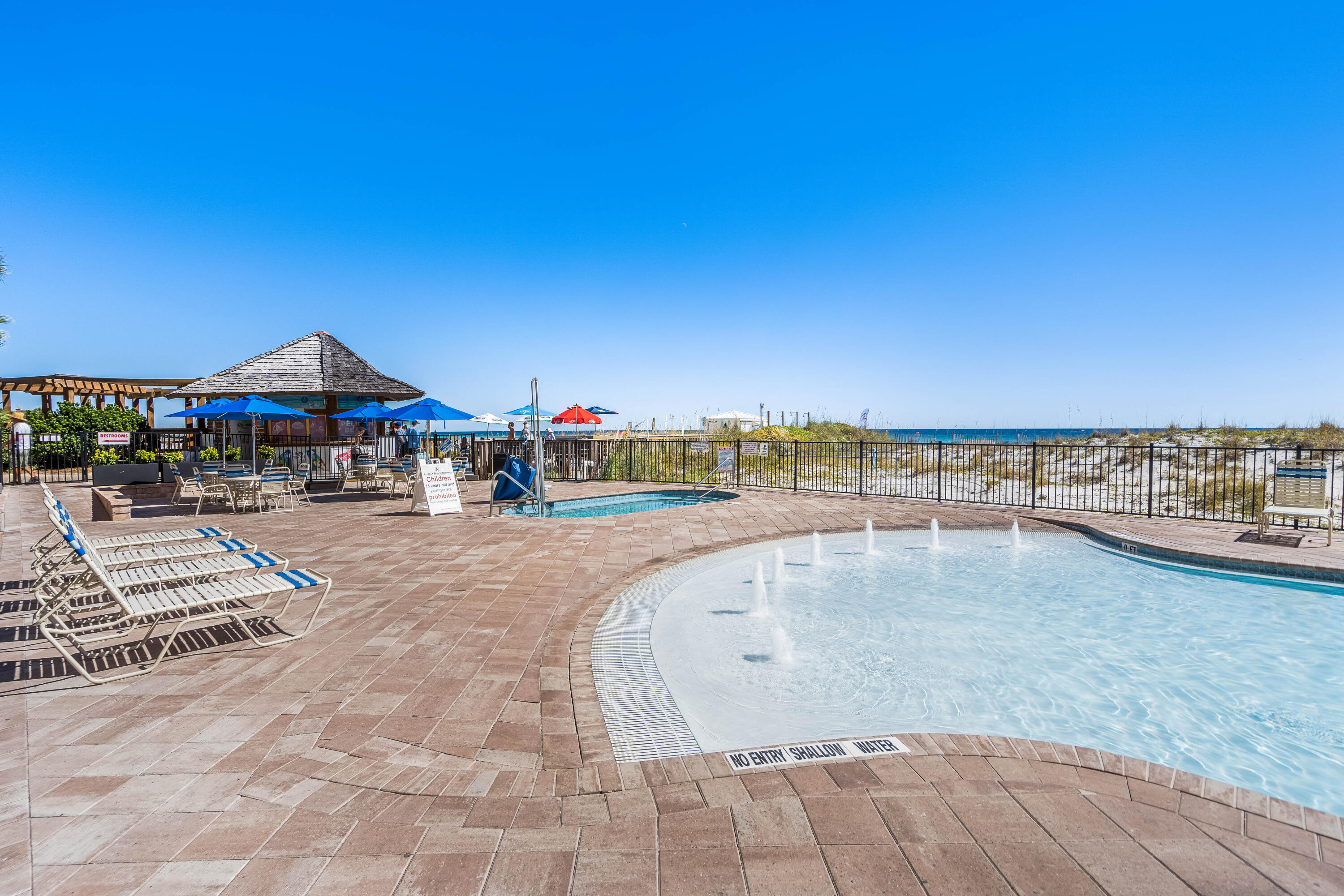 1002 Highway 98, Unit 415 Destin, FL 32541 - Photo 21 of 31 a view of swimming pool with outdoor seating and city view