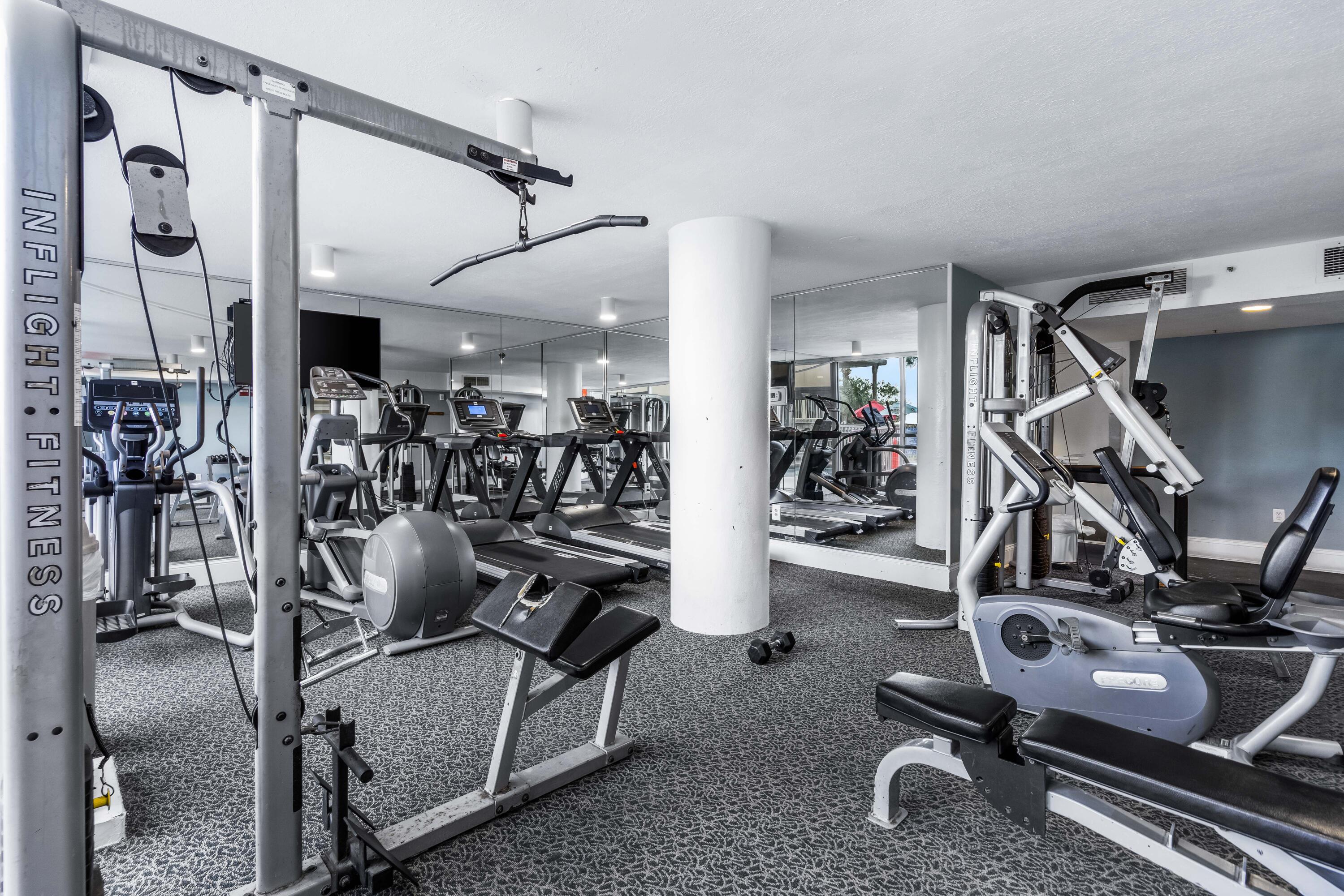 1002 Highway 98, Unit 415 Destin, FL 32541 - Photo 24 of 31 a view of a room with gym equipment