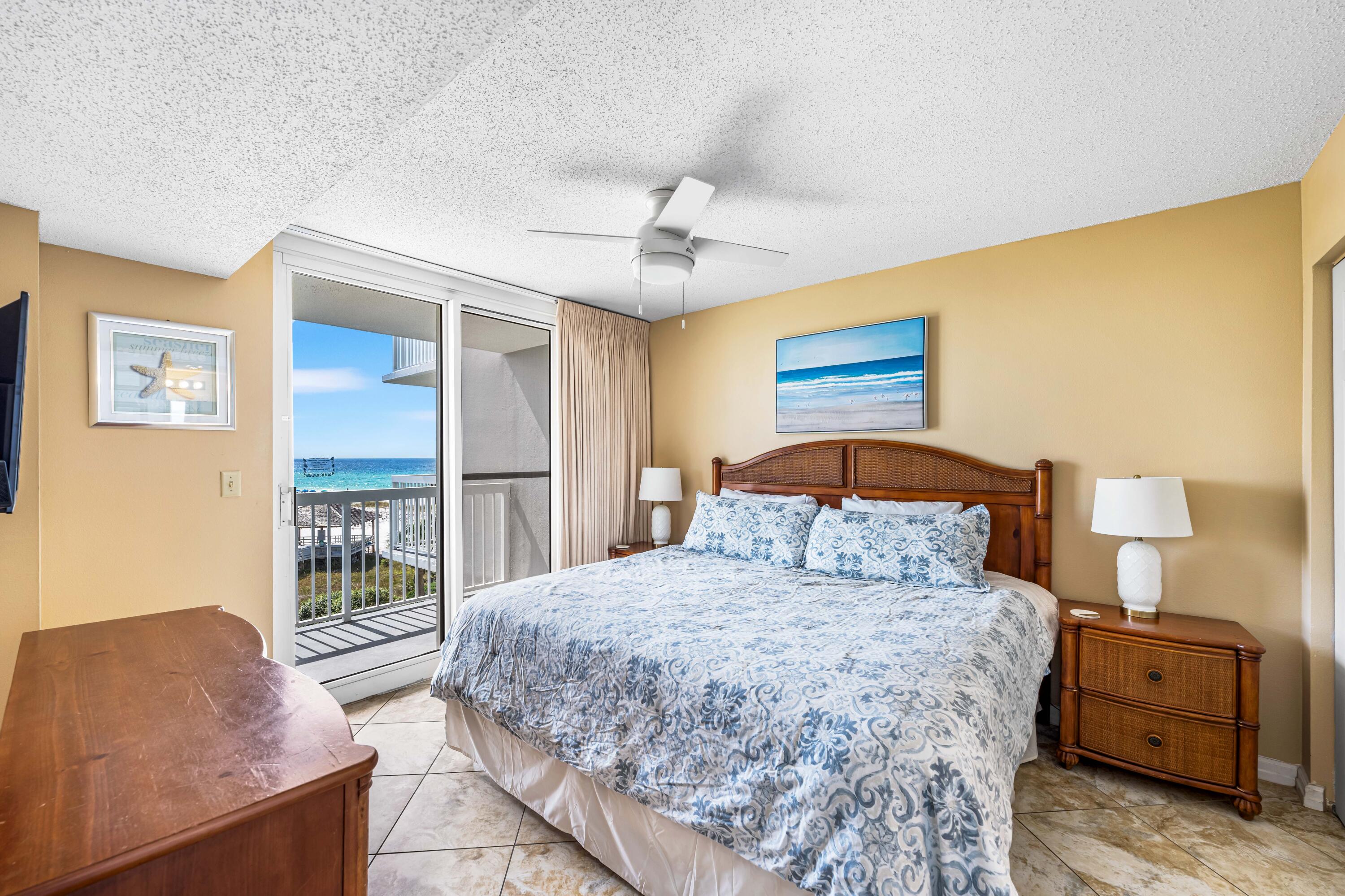 1002 Highway 98, Unit 415 Destin, FL 32541 - Photo 7 of 31 a bedroom with a large bed and a window