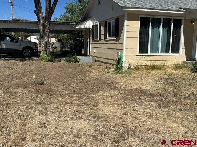 435 South Elm Street Cortez, CO 81321 - Photo 1 of 17 a view of a house with a porch