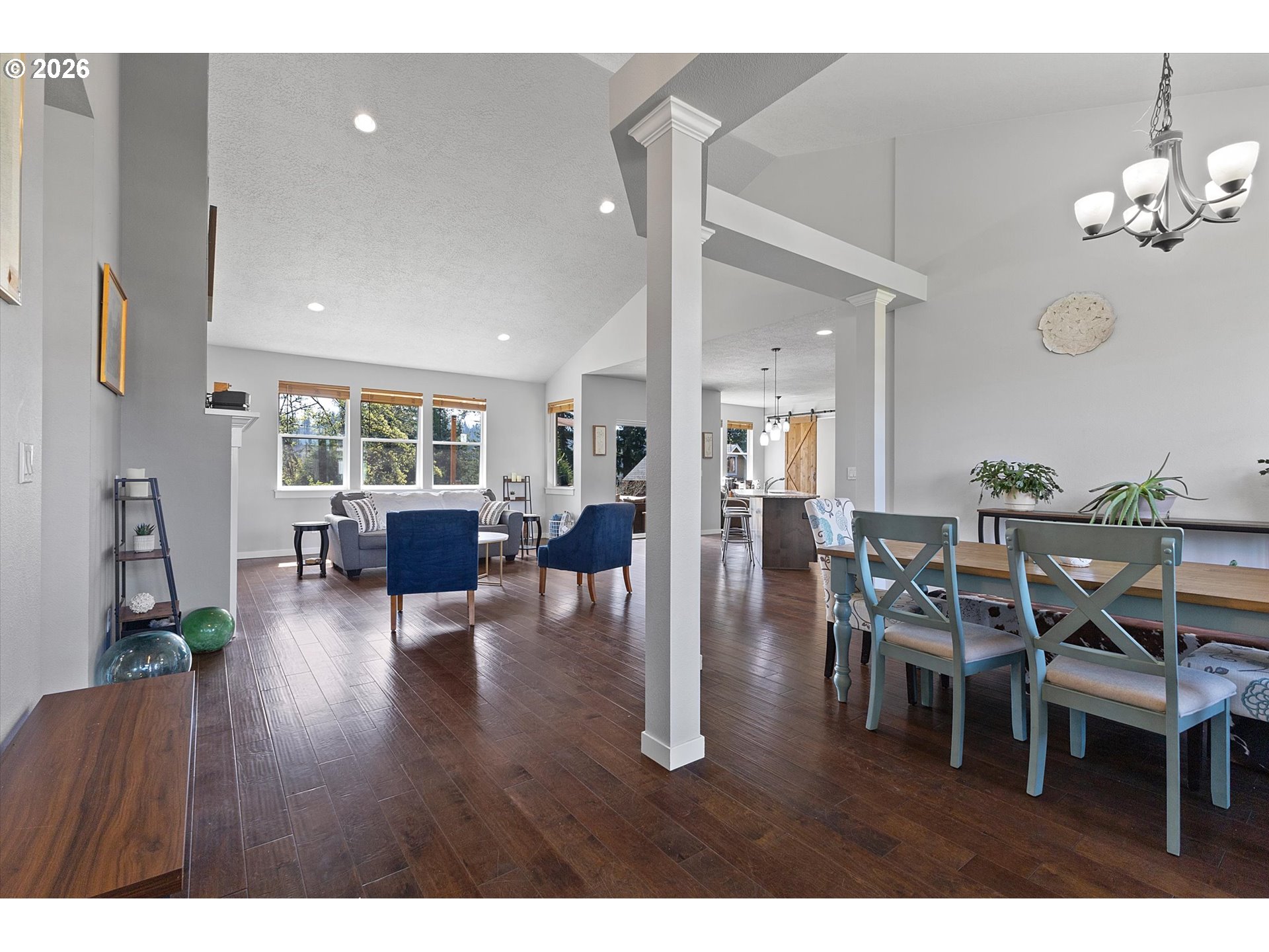 830 Southeast Darrow Road Estacada, OR 97023 - Photo 2 of 45 a living room with furniture wooden floor and dining room