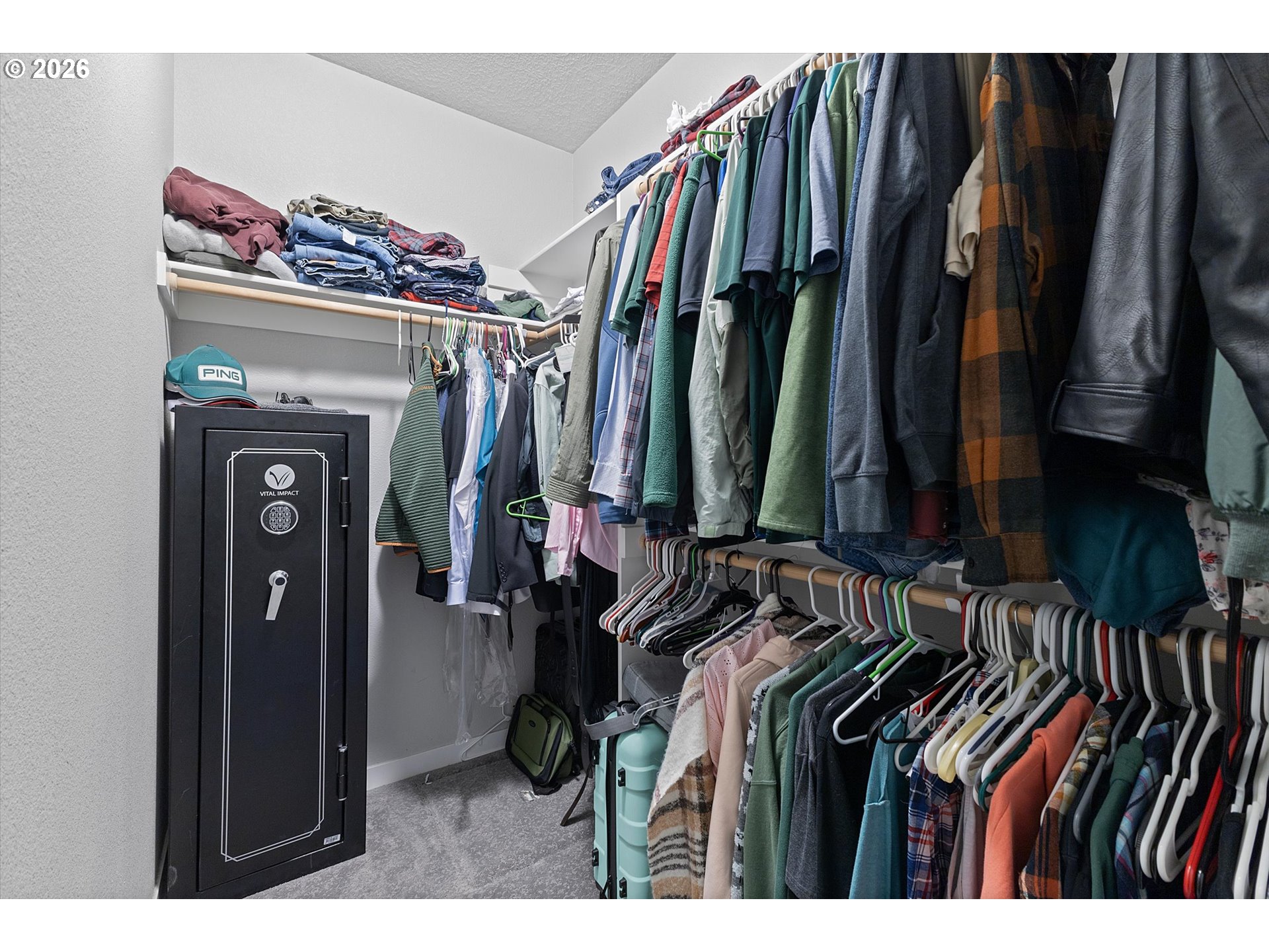 830 Southeast Darrow Road Estacada, OR 97023 - Photo 25 of 45 a view of walk in closet with clothes
